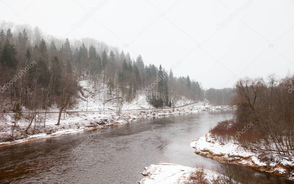 Gauja River.  A winter view of the Gauja River near Sigulda, Latvia. Sigulda is a part of the Gauja National Park.