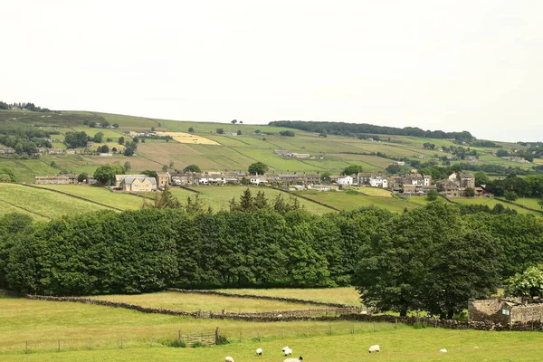 West Yorkshire Countryside.  The view across countryside towards the village of Stanbury in the parish of Haworth, West Yorkshire in Northern England.