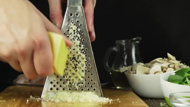 Chef Rubs Parmesan Cheese — Stock Video