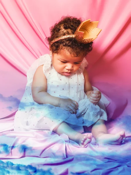 Double exposure of baby princess and blue cloudscape — Stock Photo, Image