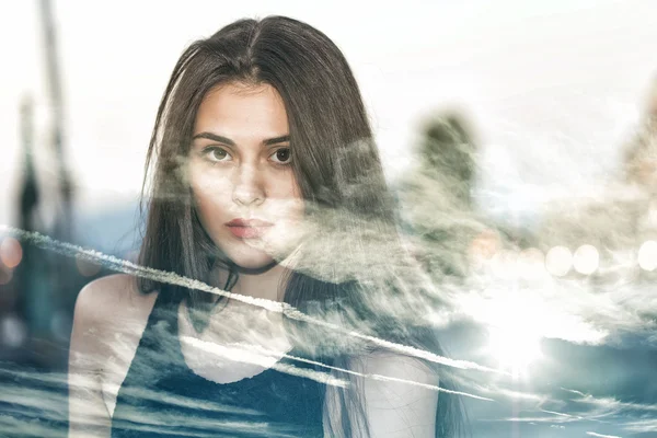 Double exposure of pretty girl and cloudy sky — Stock Photo, Image