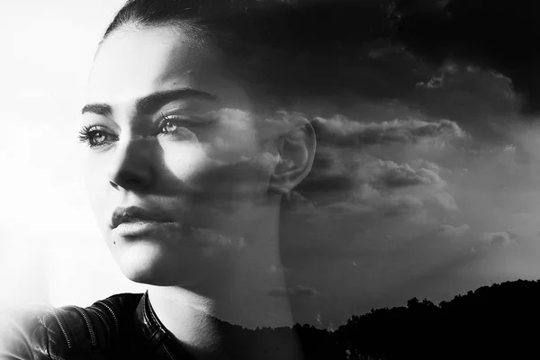 Monochrome double exposure of beautiful girl and cloudscape — Stock Photo, Image