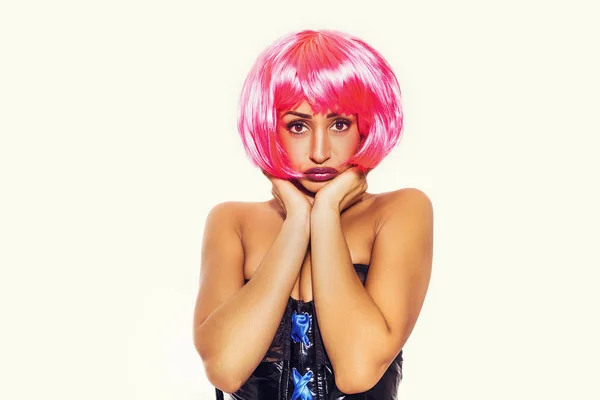 Sad pop girl portrait wearing latex dress and pink wig — Stock Photo, Image