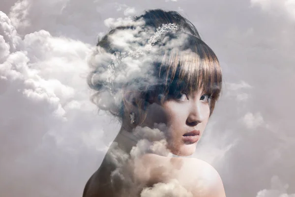 Double exposure of gorgeous bride portrait and cloudscape — Stock Photo, Image