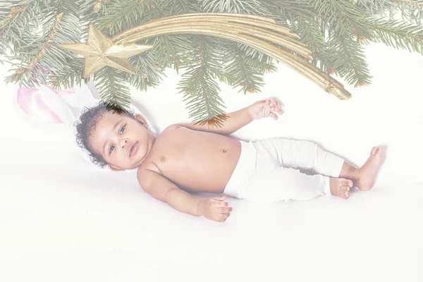 Dupla expozíció aranyos kislány és karácsonyi üstökös — Stock Fotó