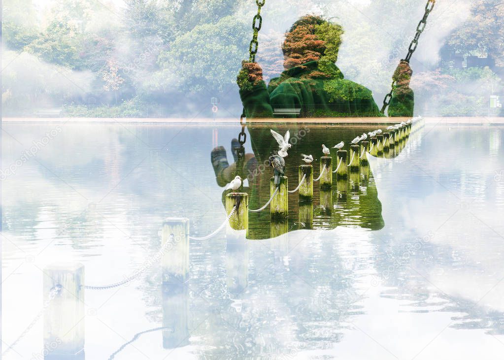 Double exposure of kid on swing and beautiful autumn lake