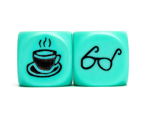 Turquoise conceptual dices - Drinking coffee while reading book