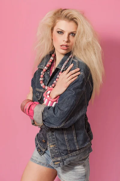 Blonde Barbie pop girl wearing jeans jacket and accessories — Stock Photo, Image