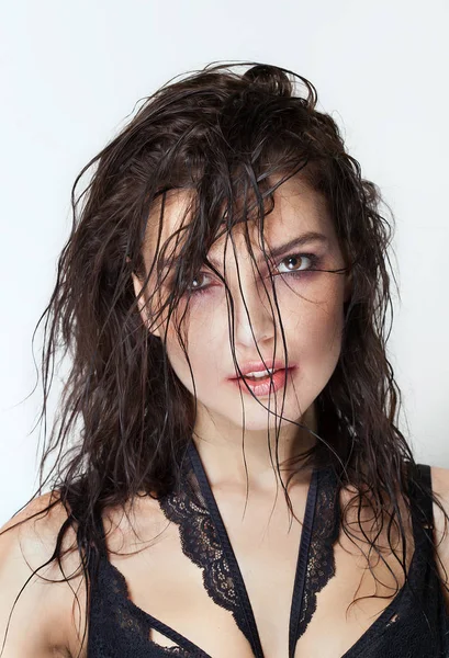 Beautiful woman portrait with wet hair and smudged makeup wearing lingerie — Stock Photo, Image