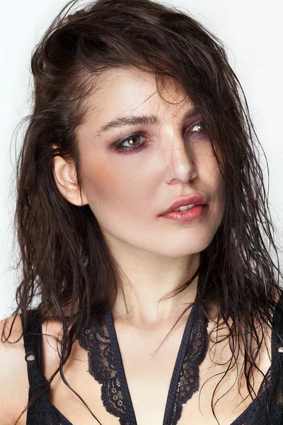 Pretty woman portrait with wet hair and smudged makeup looking aside — Stock Photo, Image