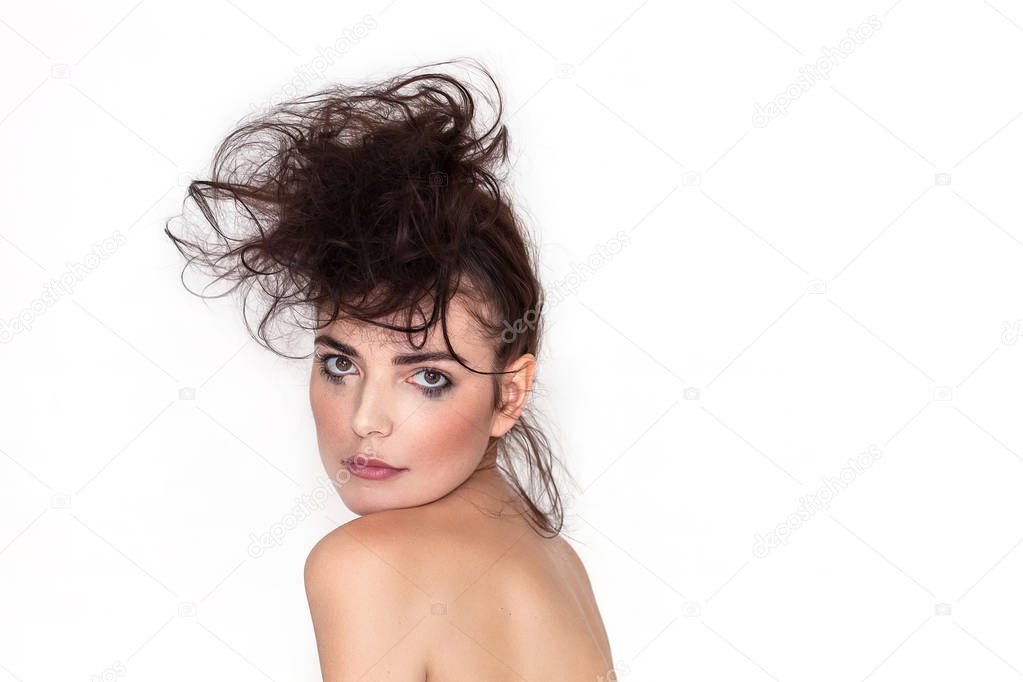 Pretty woman portrait with messy hair and smudged makeup