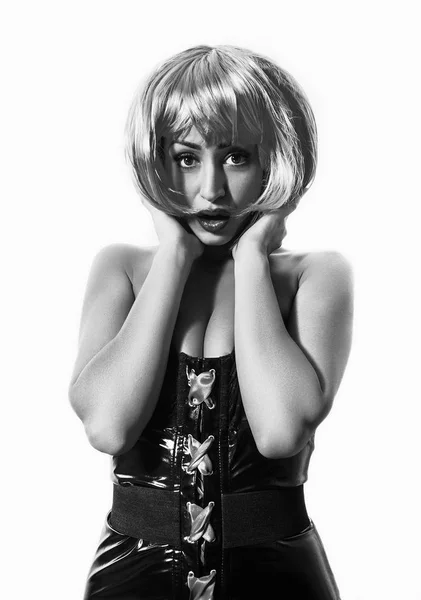 Surprised pop girl portrait wearing latex dress and wig monochrome — Stock Photo, Image
