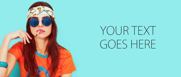 Beautiful hippy girl portrait smoking and wearing sunglasses, card