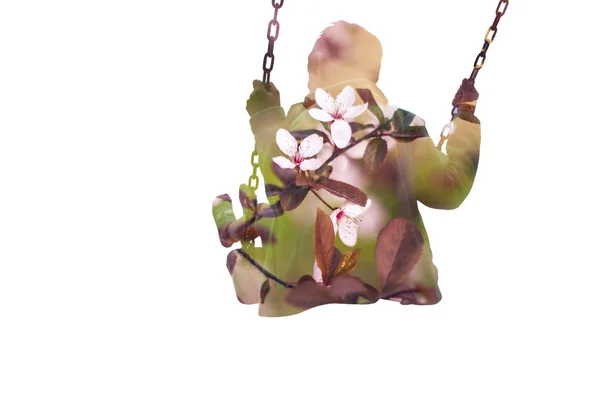 Double exposure of kid on swing and cherry tree blossoms — Stock Photo, Image