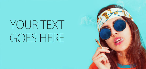 Hippie girl portrait smoking and wearing sunglasses, card