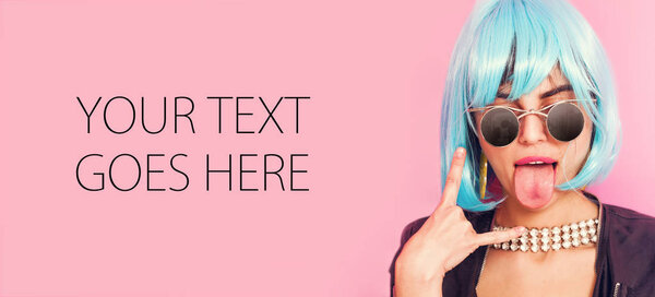 Odd girl portrait with stuck-out tongue making the horns, card