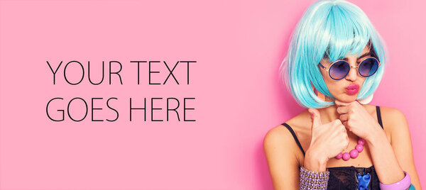 Pop girl portrait with thumbs up wearing weird accessories, card