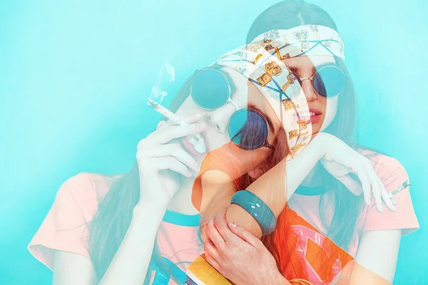 Double exposure of hippy girl portrait smoking weed and wearing sunglasses — Stok Foto