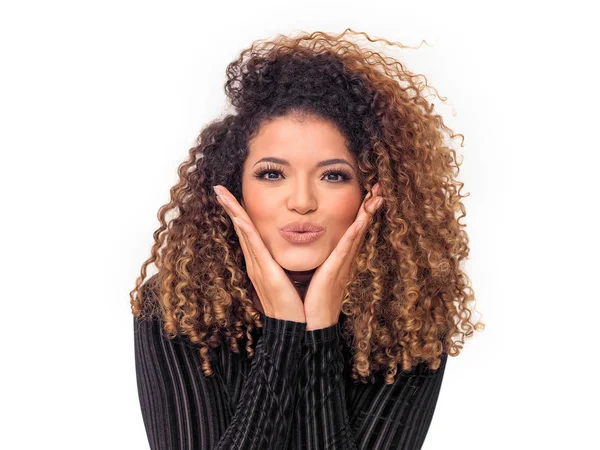 Lovely woman portrait with gorgeous curly hair giving a kiss — Stock Photo, Image