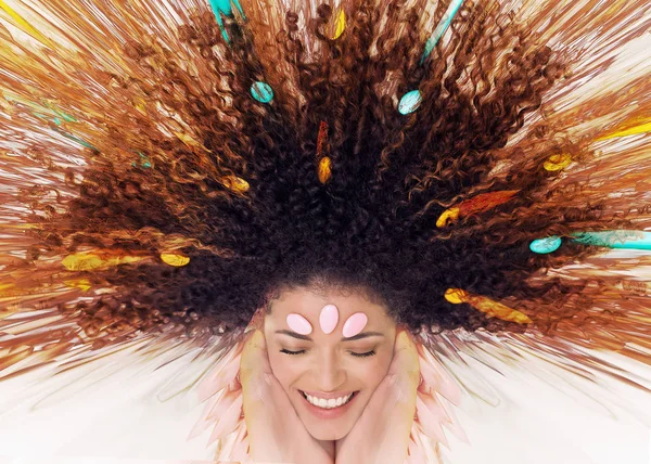 Abstract portrait of beautiful happy woman with sugared almonds — Stock Photo, Image