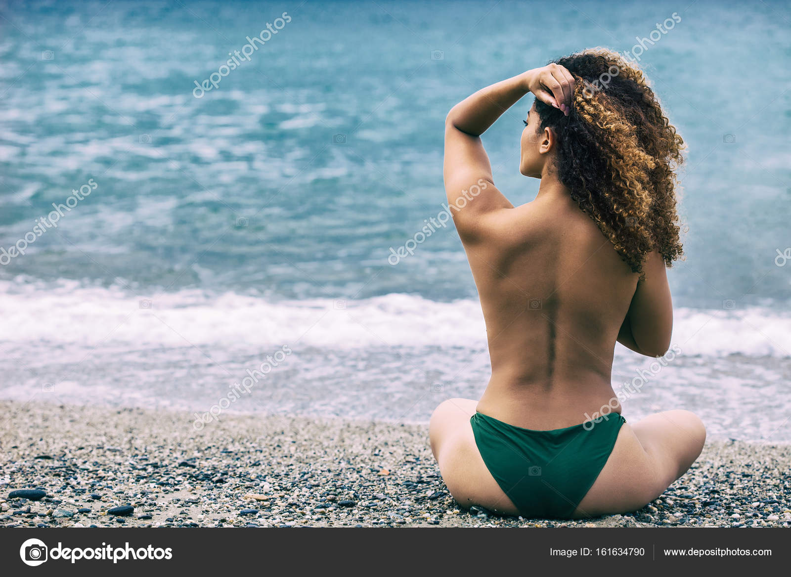 curly nudist out of sea