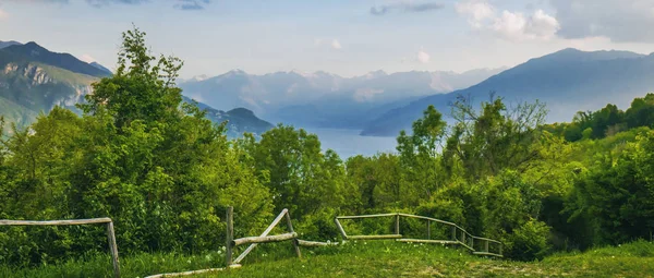 Lake Como glimpse and beautiful scenery seen from Civenna, Italy - Letterbox — Stock Photo, Image