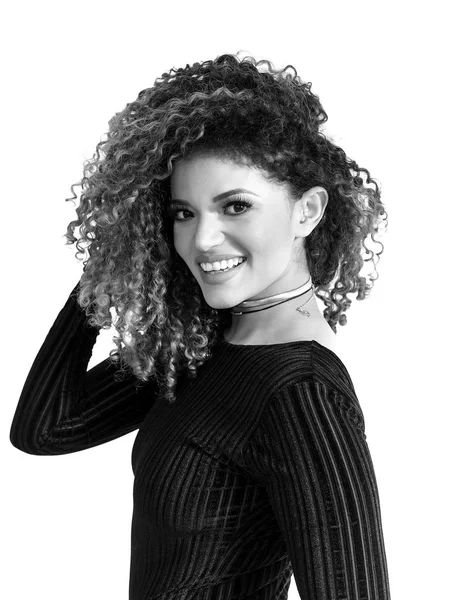 Pretty woman portrait with gorgeous curly hair looking and smiling, monochrome — Stock Photo, Image