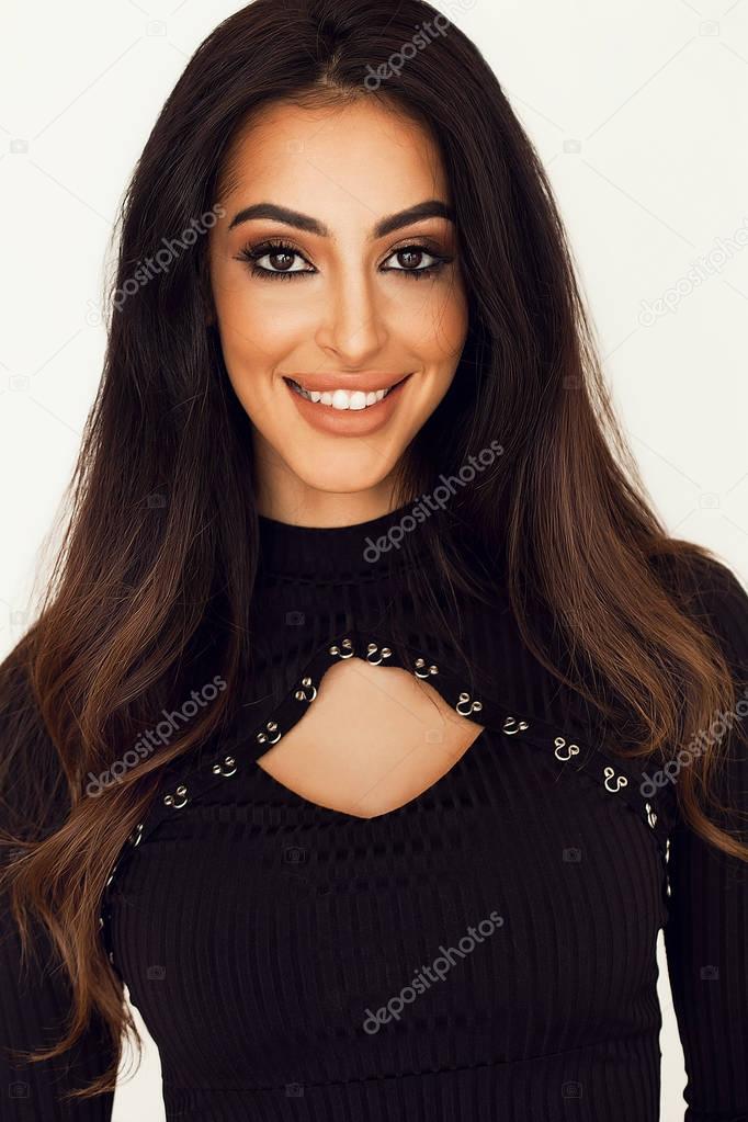 Gorgeous woman portrait wearing black leotard and smiling widely