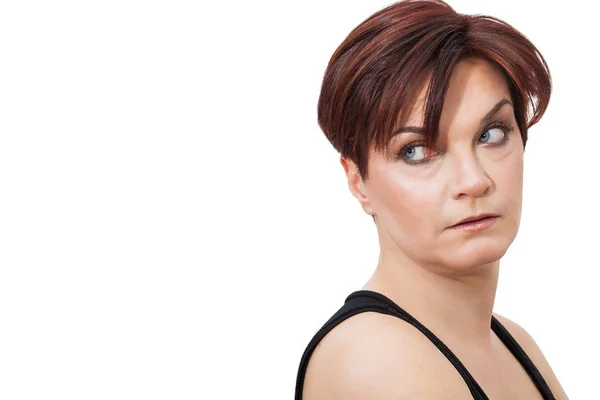 Beautiful woman portrait looking over her shoulder with annoyed look — Stock Photo, Image