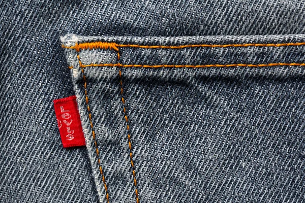 Close up of the LEVI'S  label on the blue jeans — Stock Photo, Image