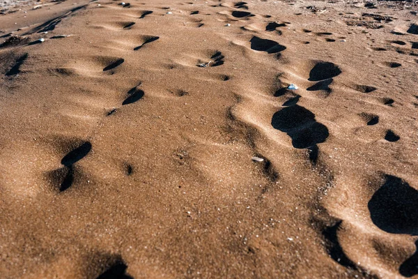 Voetafdrukken op zand — Stockfoto