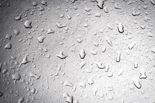 Yağmur damlaları araba yüzeyi — Stok fotoğraf