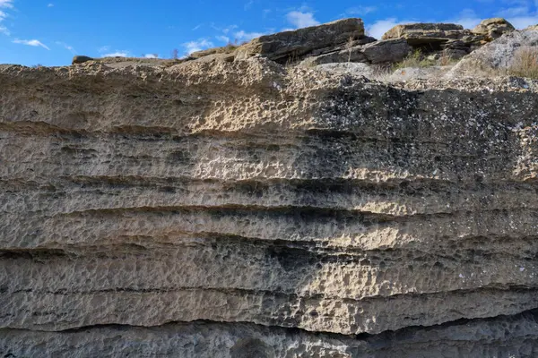 Hintergrund sedimentärer Gesteinsschichten — Stockfoto