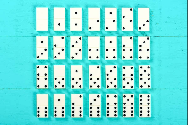 Playing Dominoes Blue Wooden Table — Stock Photo, Image