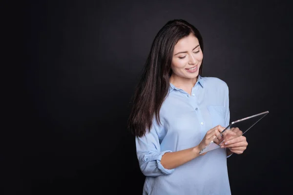 Positive smiling woman using modern tablet — Stock Photo, Image