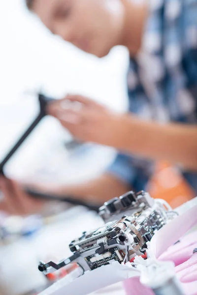 Close up of drone detail and a man — Stock Photo, Image