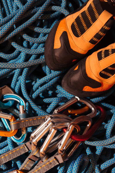 Close up of insurance ropes and boots for climbing