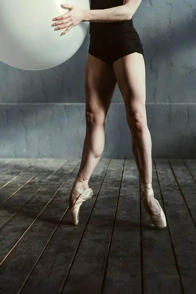 Graceful ballet dancer legs in pointes