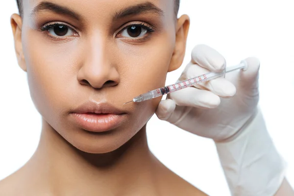 Young Negroid woman having cosmetology procedure — Stock Photo, Image