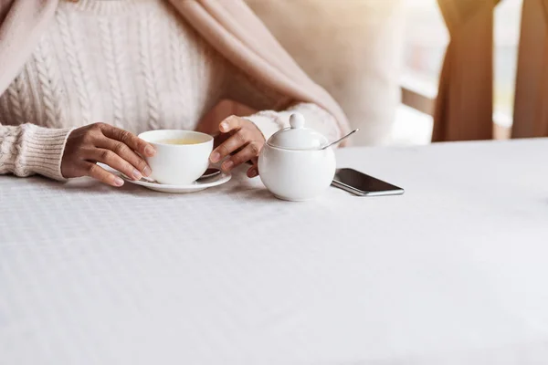 Young African American man enjoying his breakfast in the cafe — Stock Photo, Image