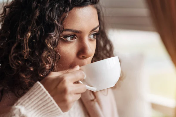 Involved African American woman drinking the cup of tea — Stock Photo, Image
