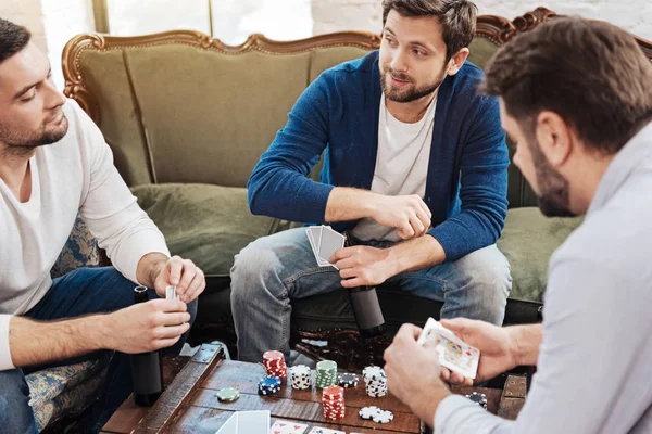 Pleasant male friends entertaining themselves — Stock Photo, Image