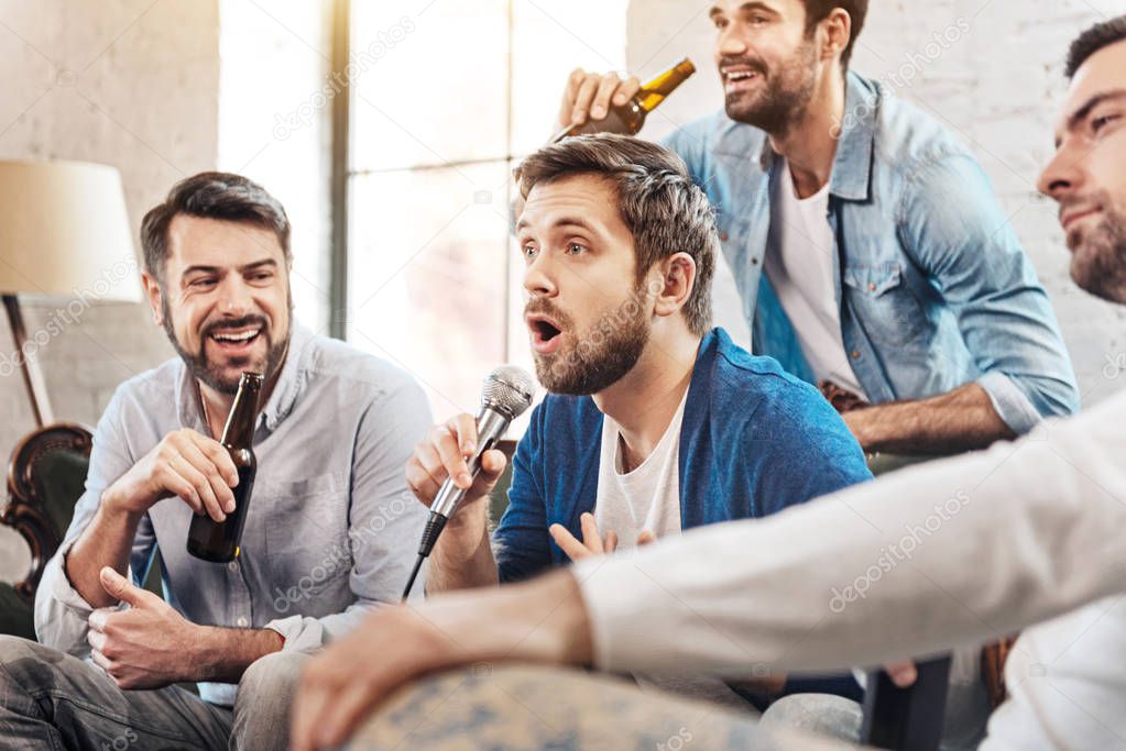 Nice handsome man singing a song