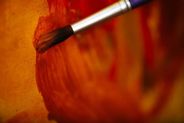 Close up of brush painting a picture — Stock Photo, Image