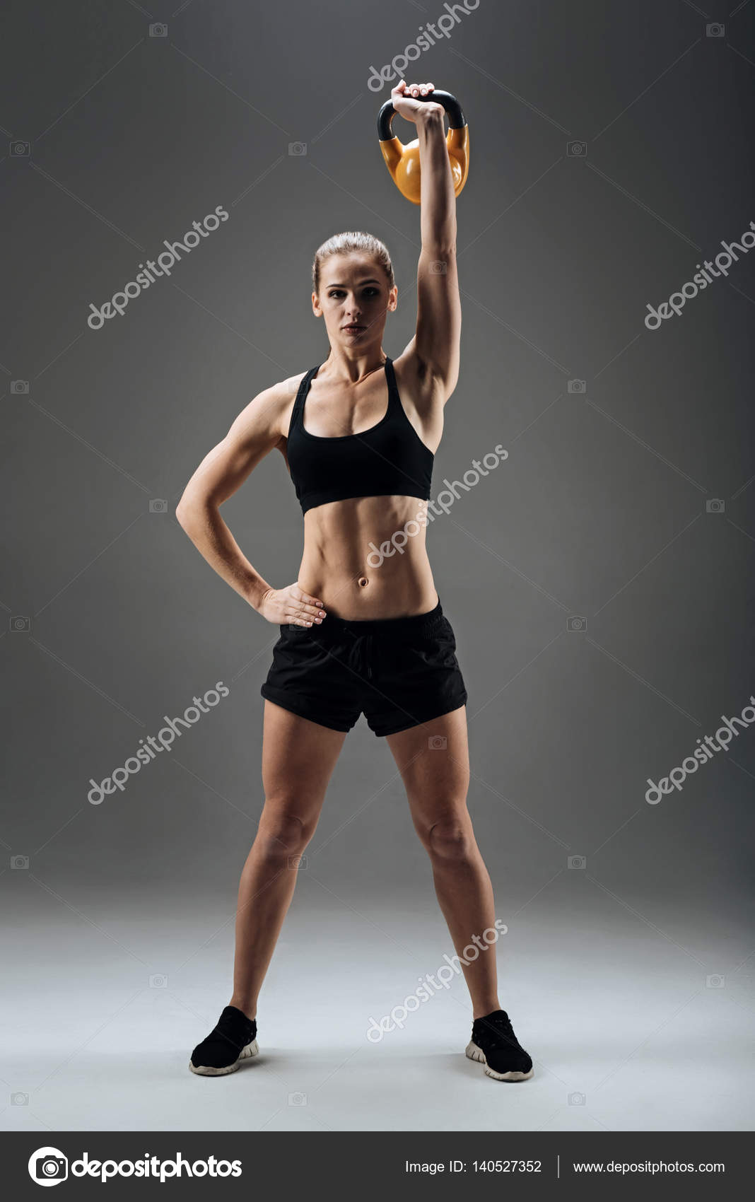 Strong Woman Is Posing Against Brick Wall Stock Photo, Picture and Royalty  Free Image. Image 20696681.