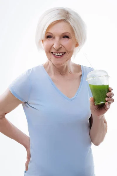 Amazing smiling female posing with smoothie — Stock Photo, Image