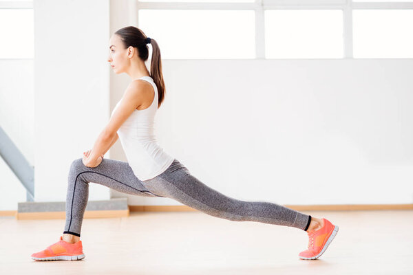 Nice confident woman doing aerobics