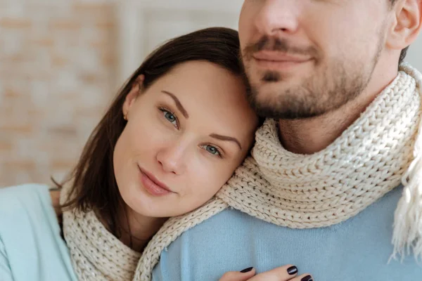 Delighted peaceful couple hugging each other at home — Stock Photo, Image