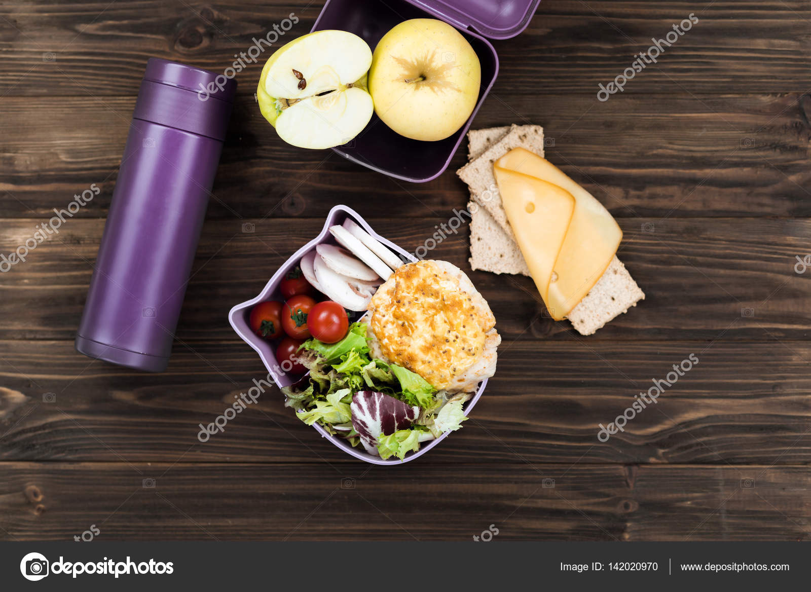 Violet thermos lying near the lunch box Stock Photo by ©yacobchuk1 142020970