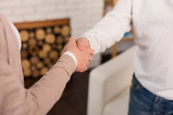 Close up of a handshake between people — Stock Photo, Image